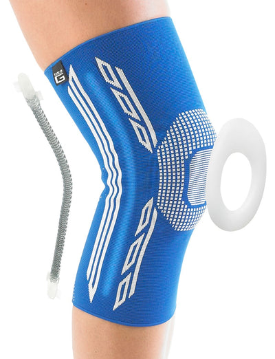 Knee with Neo G Airflow Plus Stabilized Knee Support with Silicone Patella Cushion on, highlighting cushion and metal spiral stays